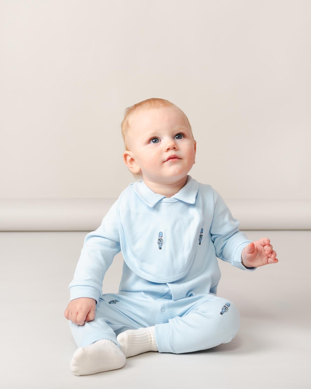 Caramelo Sky Blue Soldier Babygrow with Bib