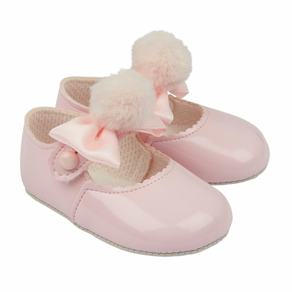 Pink Patent Soft Bottom Pram Shoe With Pink Ribbon Bow & Pom Pom